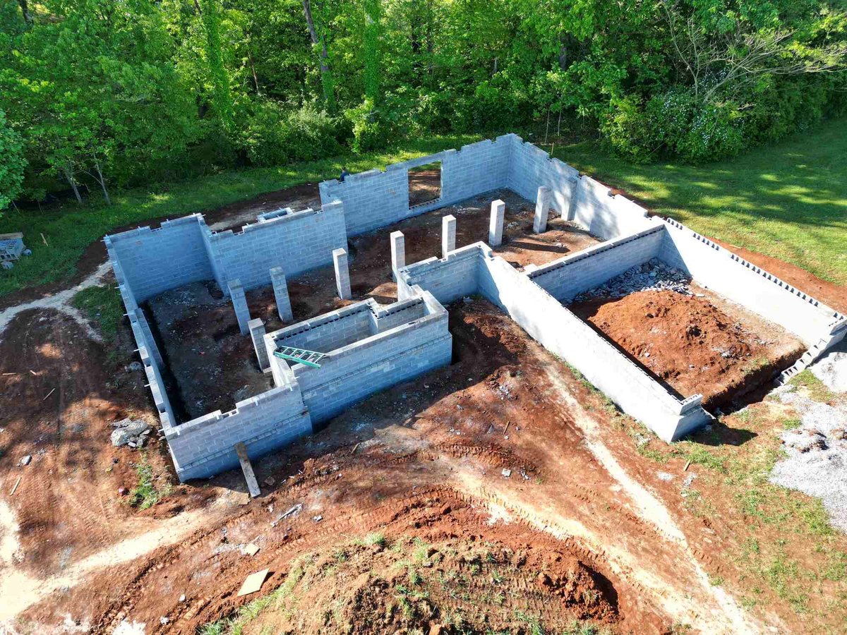 Aerial view of foundation work on a custom home project by Debuty Builders in Knoxville, TN