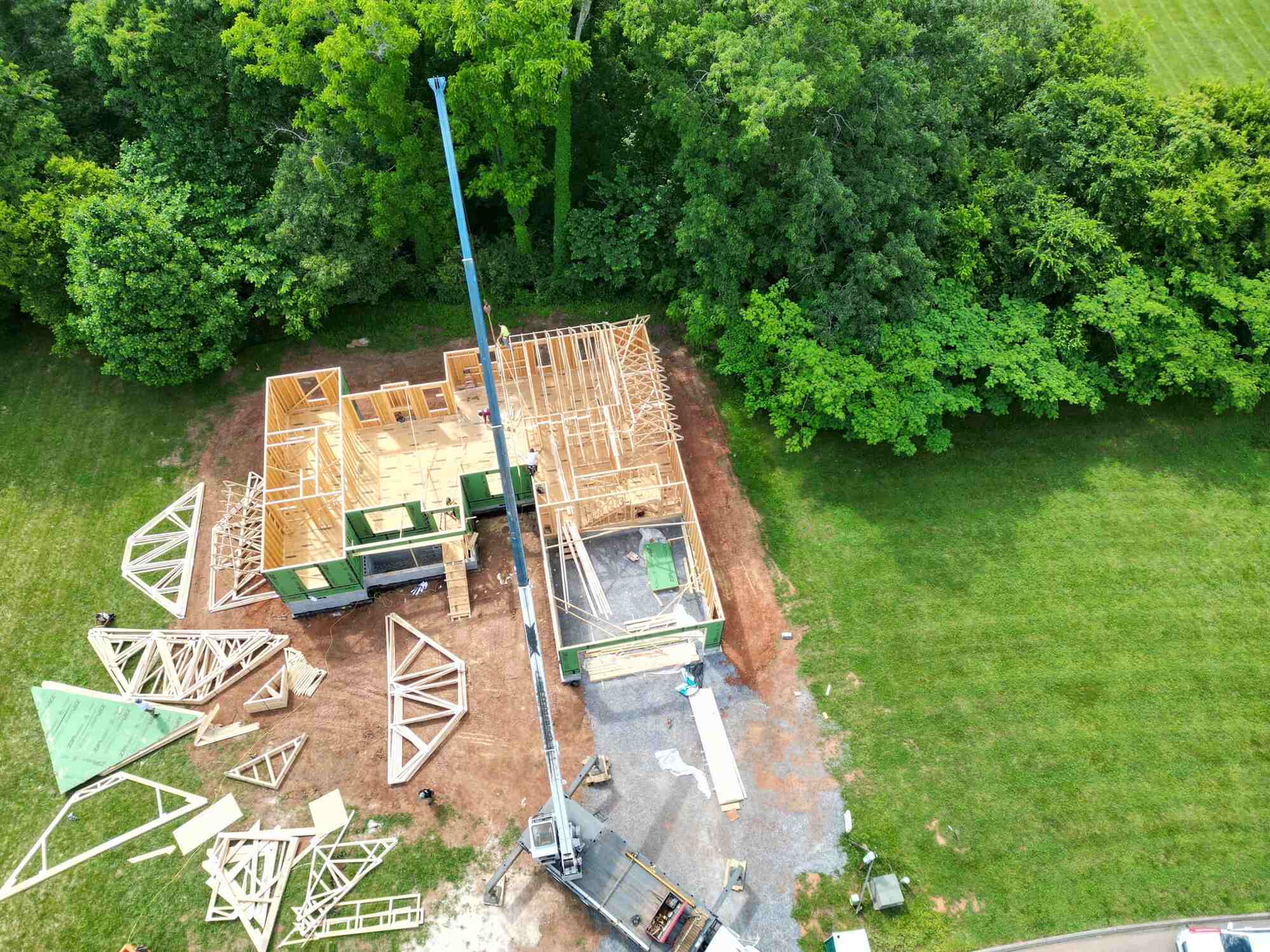 Aerial view of roof framing for a custom home by Debuty Builders in Knoxville, TN