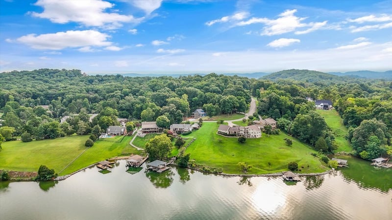 ommunity landscape view with custom homes near water in Friendsville Custom Home in Knoxville, TN