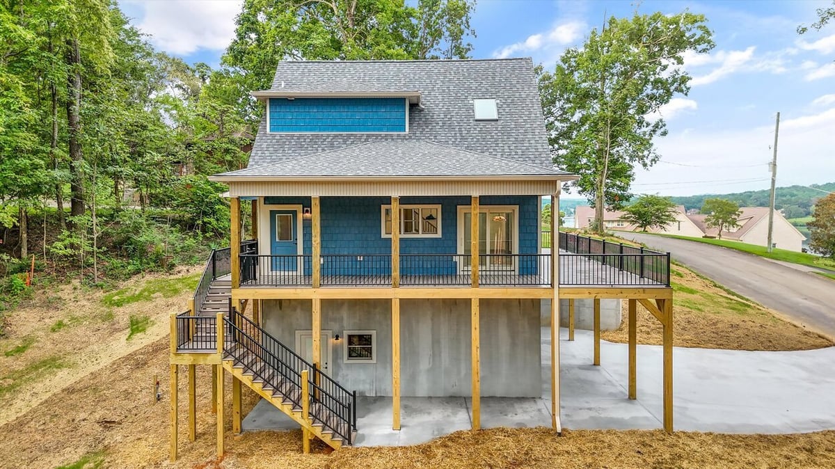 Custom-built home with elevated foundation and scenic hillside setting in Friendsville Custom Home in Knoxville, TN