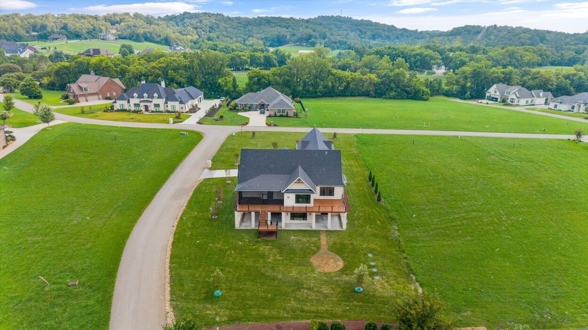 Elevated deck and backyard seen from above in Louisville, TN Custom Home