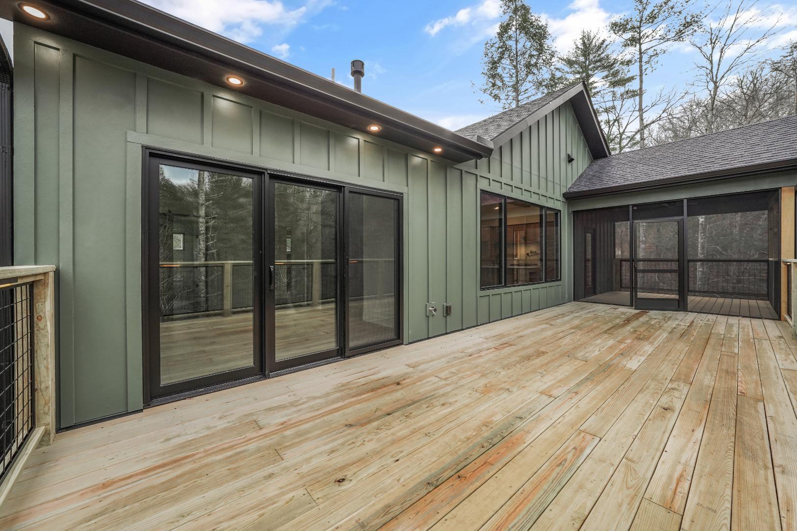 Side view with porch of custom home in Knoxville, TN