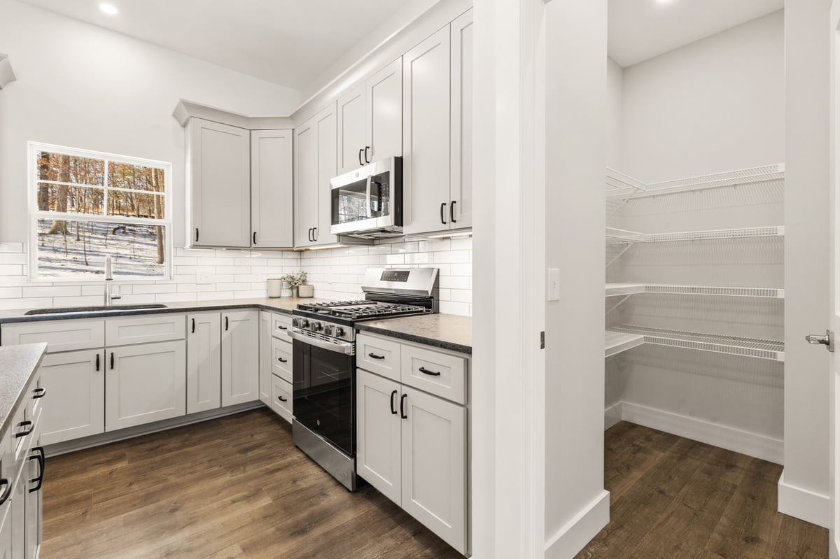 Kitchen with walk-in pantry in Vonore custom home in Knoxville, TN