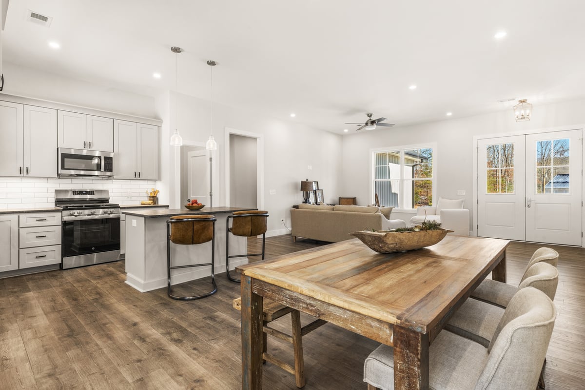 Kitchen, dining, and living room view in Vonore custom home in Knoxville, TN