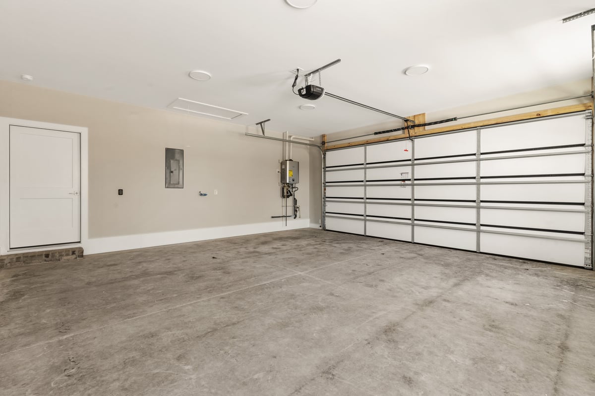 Two-car garage interior in Vonore custom home in Knoxville, TN