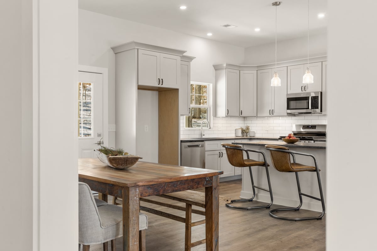 View of kitchen from dining area in Vonore custom home in Knoxville, TN
